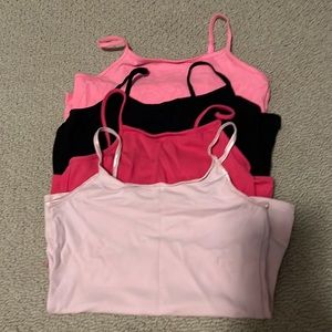Girls size small tank tops. 2 Justice, 1 Cat and Jack, 1 Faded Glory